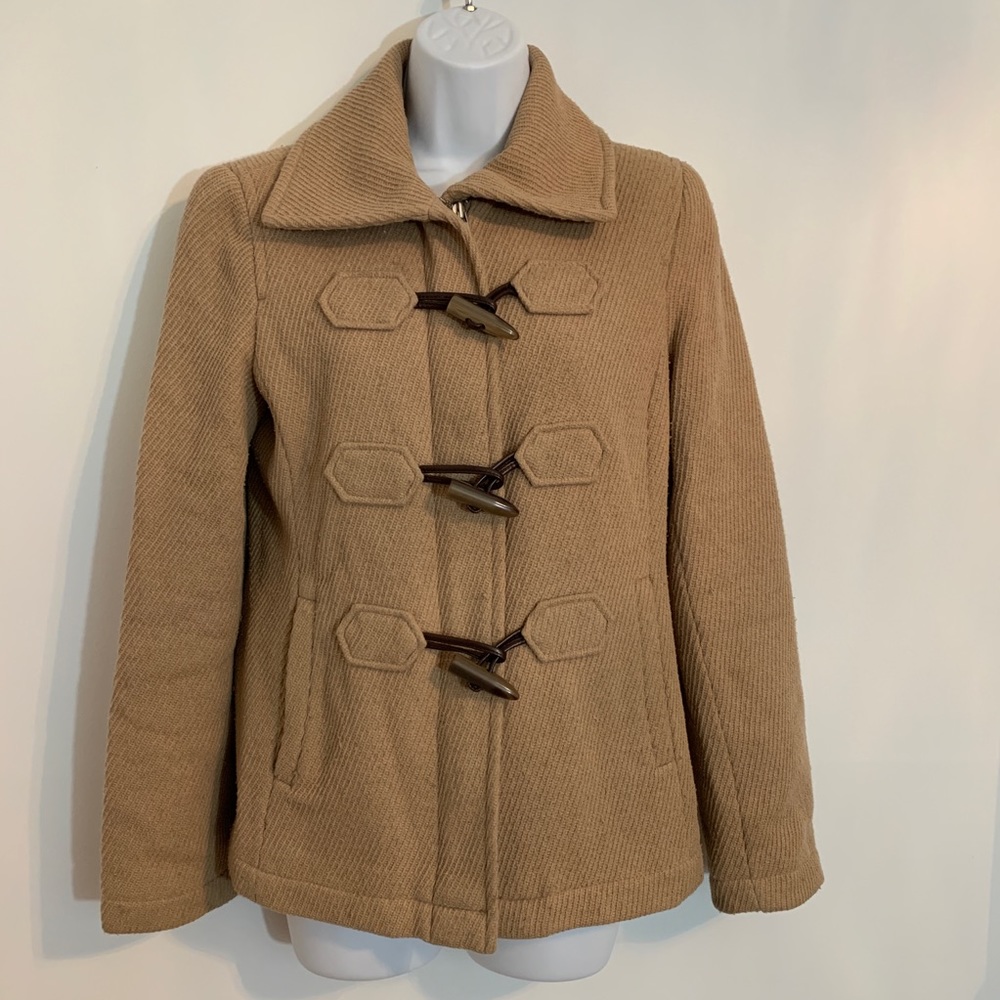 Tan wool coat by Ann Taylor is in excellent condition  Size small